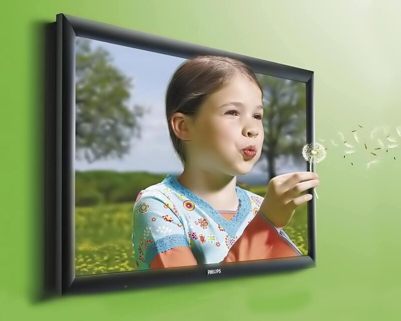 girl blowing dandelion seeds