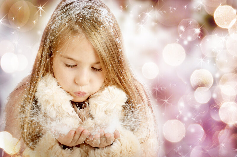 Girl Blowing Snow