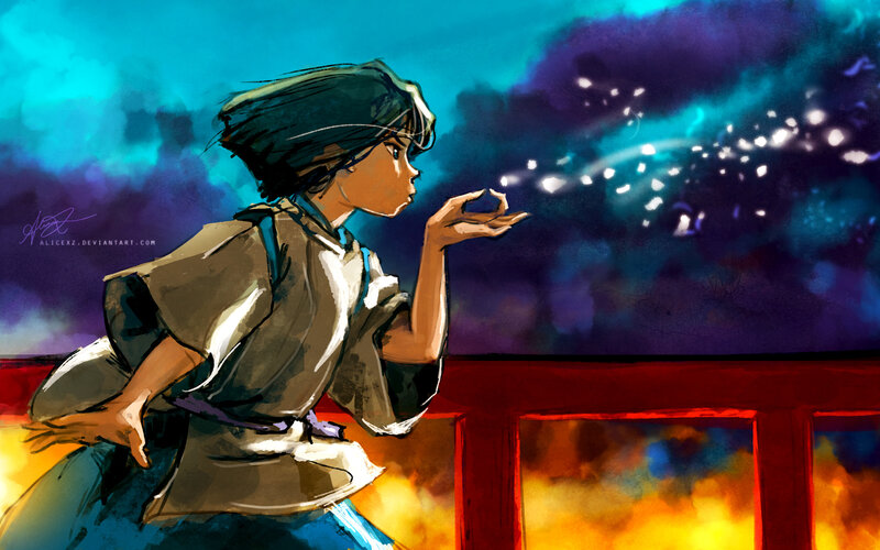 girl blowing sparkles at night