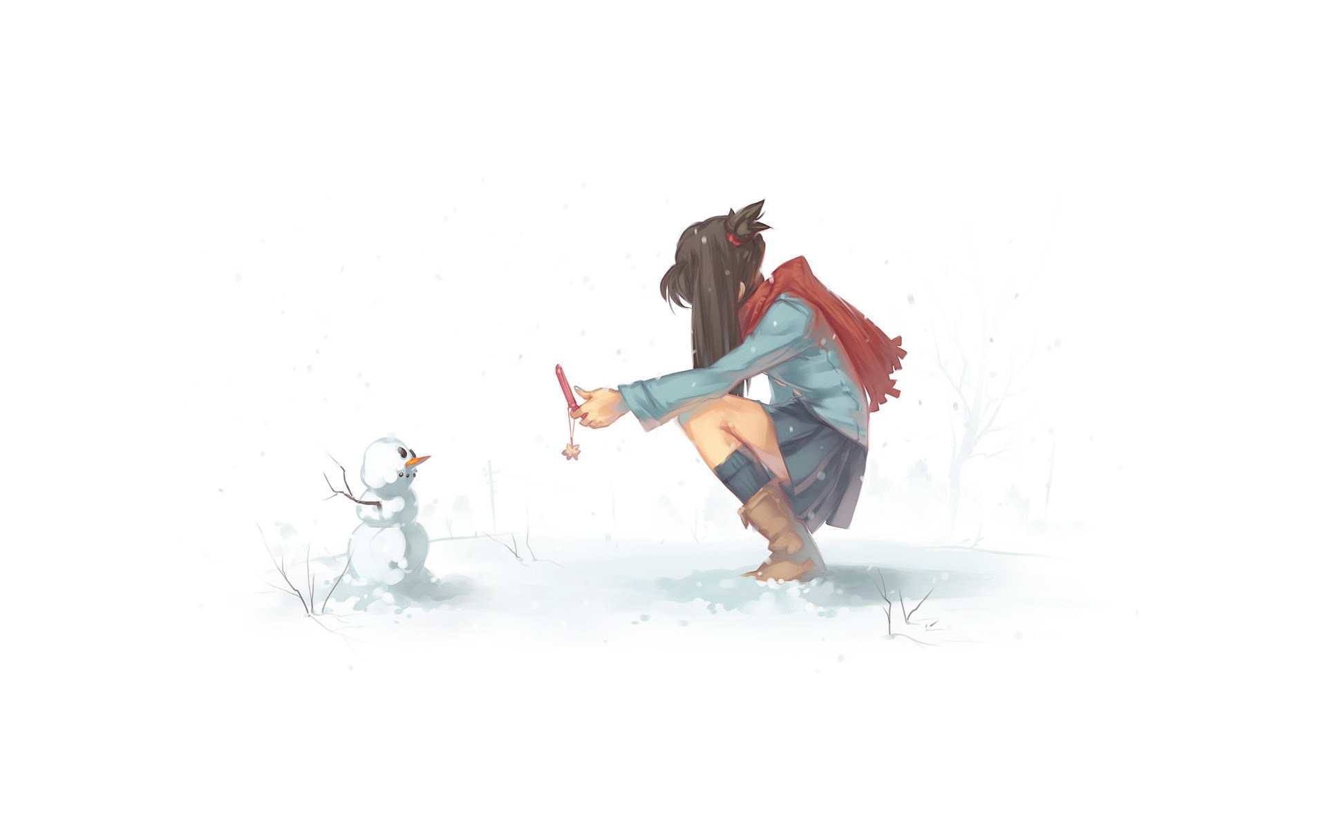 girl building snowman in winter