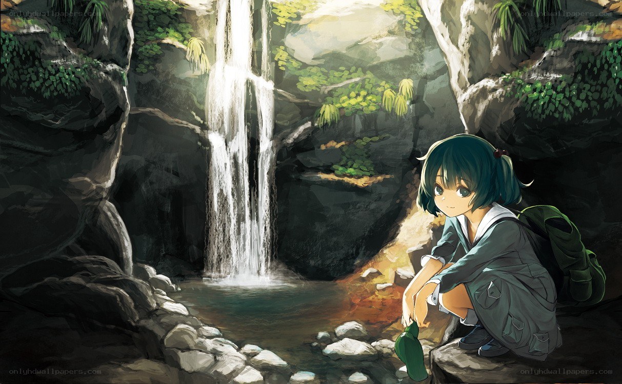 Girl by a waterfall