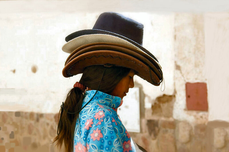 Girl Carrying Hats