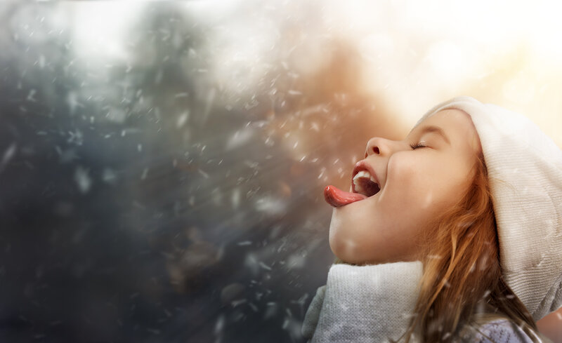 Girl Catching Snowflakes