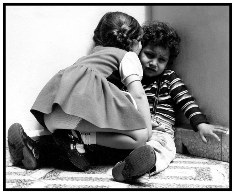 Girl Comforting Crying Boy