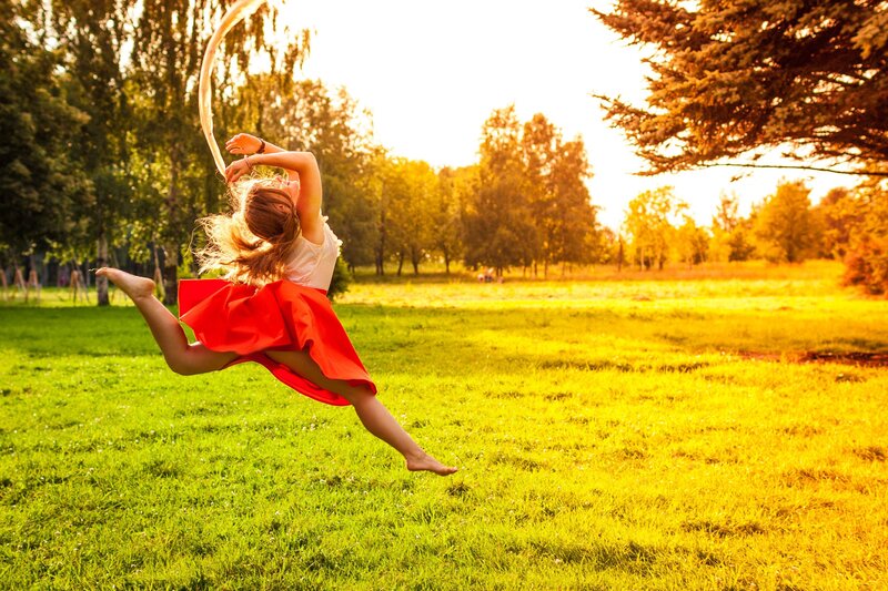 Girl Dancing in Field — Green
