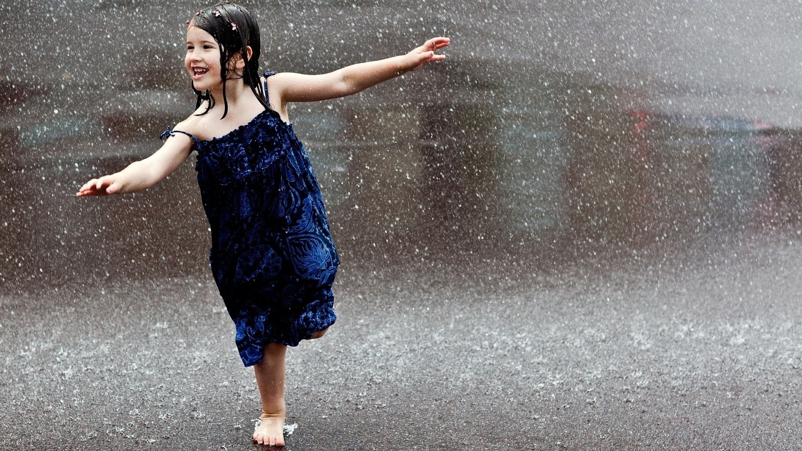 girl dancing in the rain