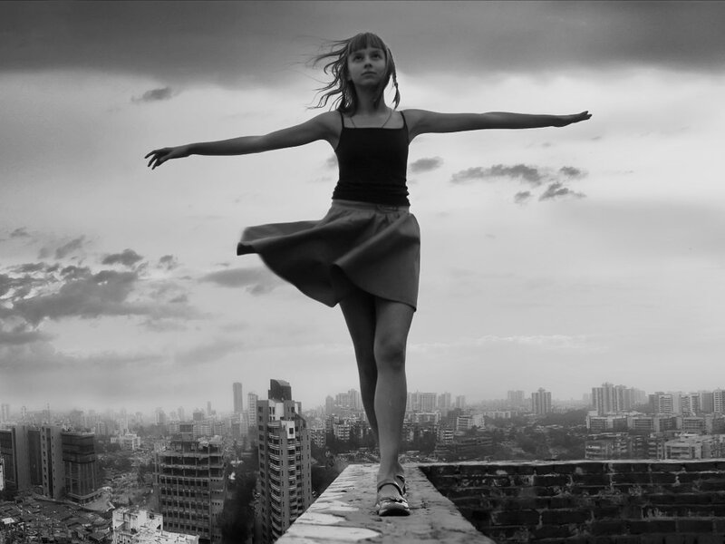 Girl Dancing on Rooftop — Black