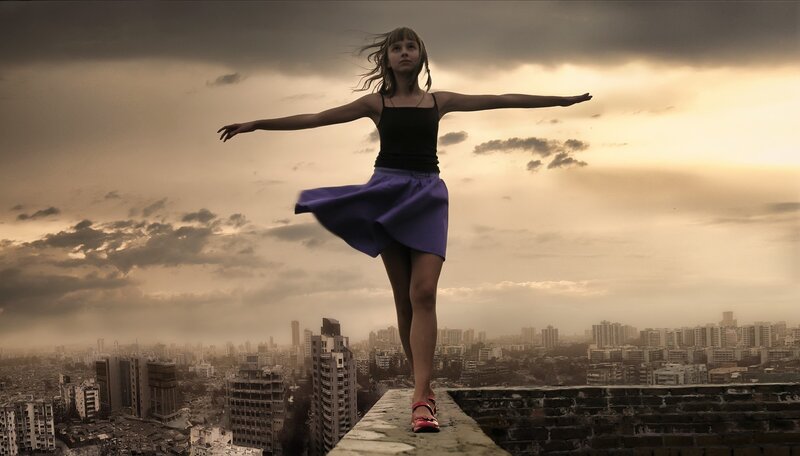 Girl dancing on rooftop