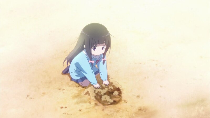 girl digging in sand