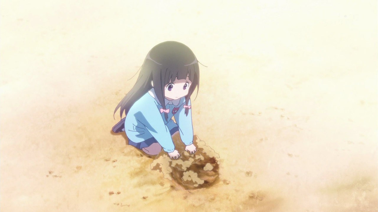 girl digging in sand