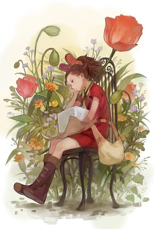 Girl drawing in a garden