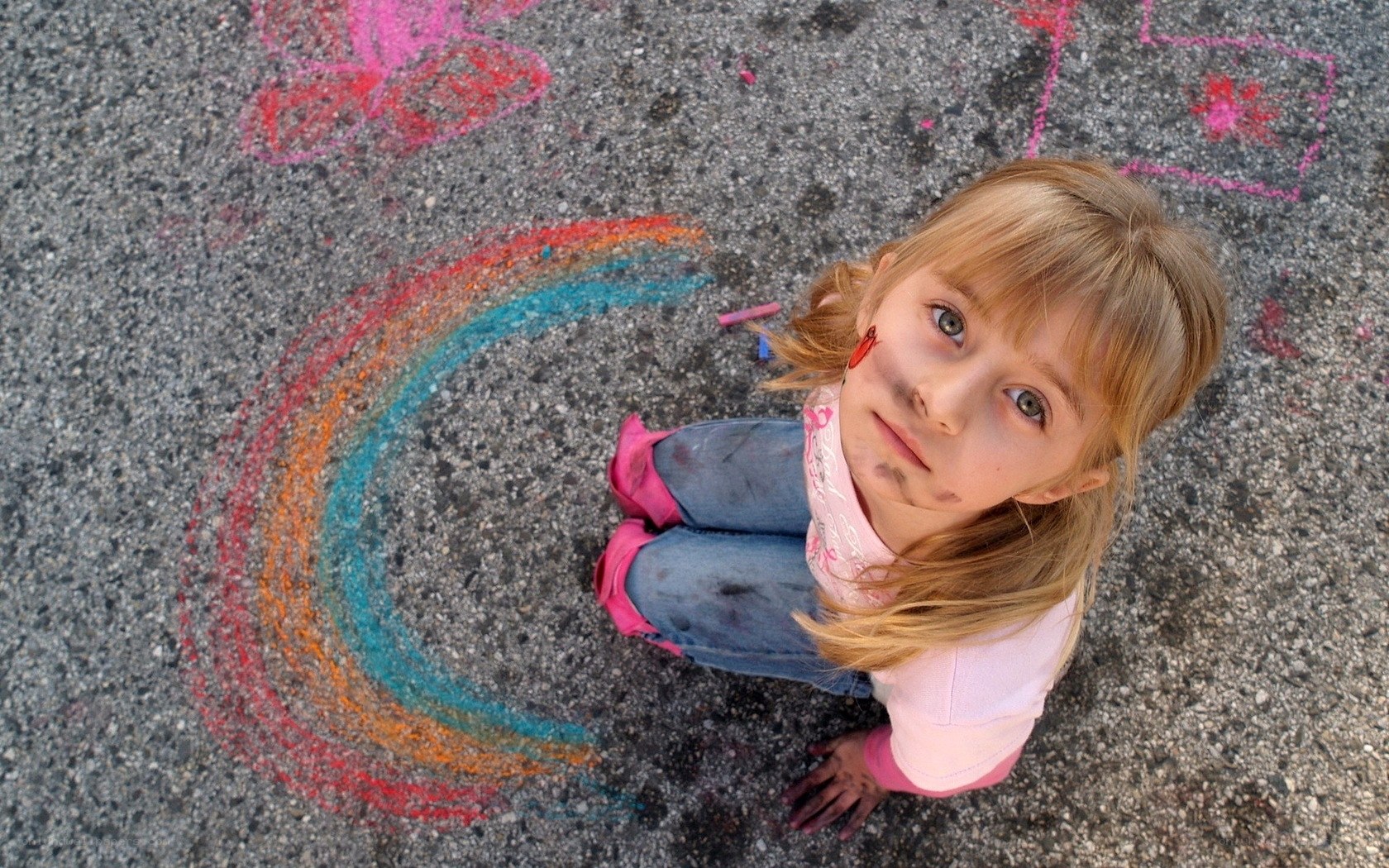 girl drawing with chalk