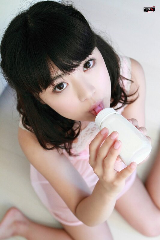 girl drinking from a bottle
