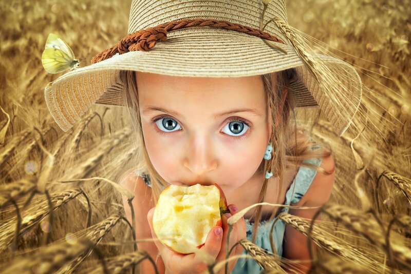 Girl Eating Apple — Golden, Serene