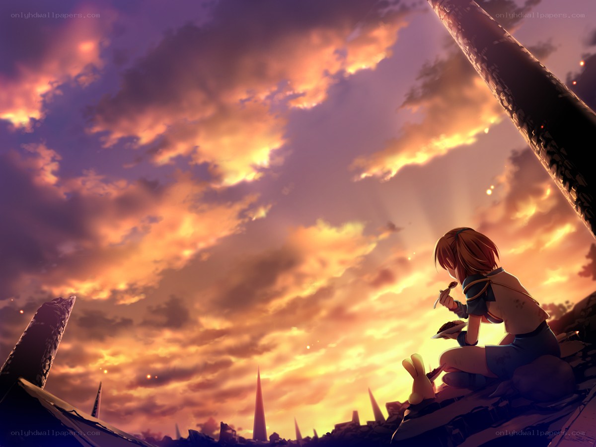 Girl eating at sunset