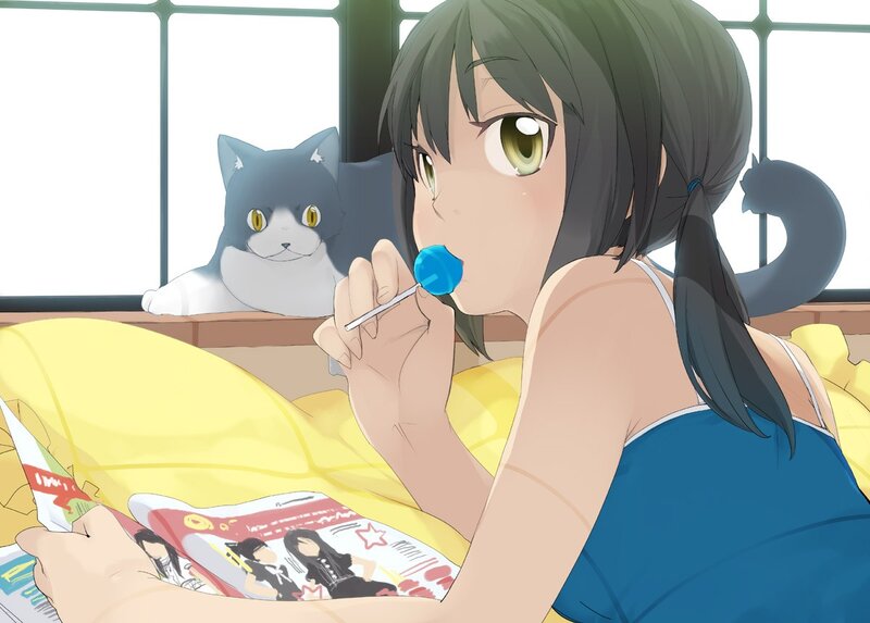 Girl eating lollipop in bed