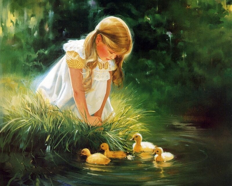Girl feeding ducklings by a pond