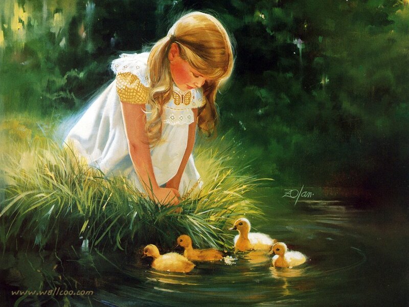 girl feeding ducklings by pond