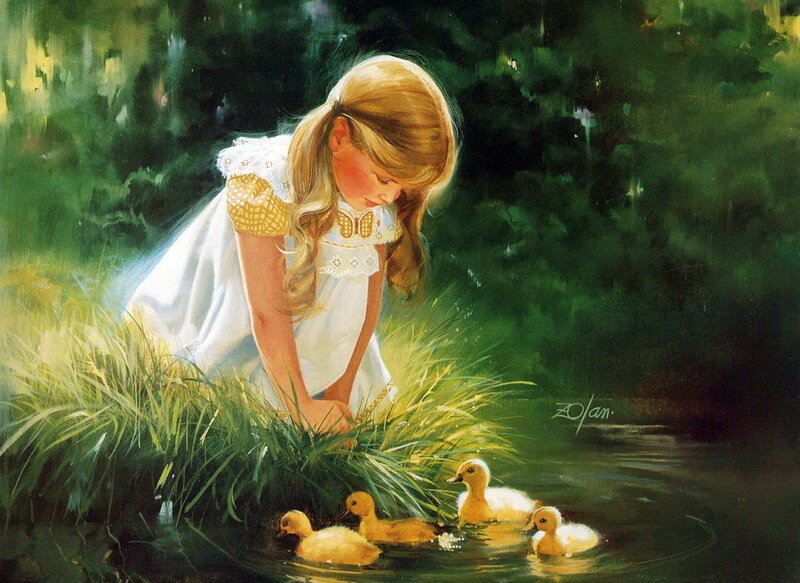 Girl feeding ducklings by pond
