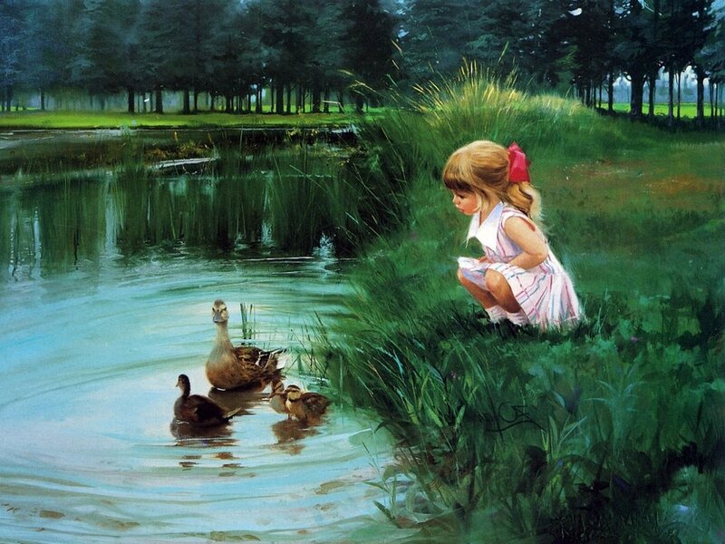 Girl feeding ducks by a pond