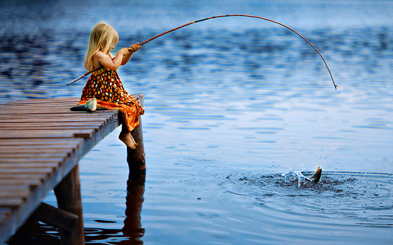 Girl Fishing on Dock