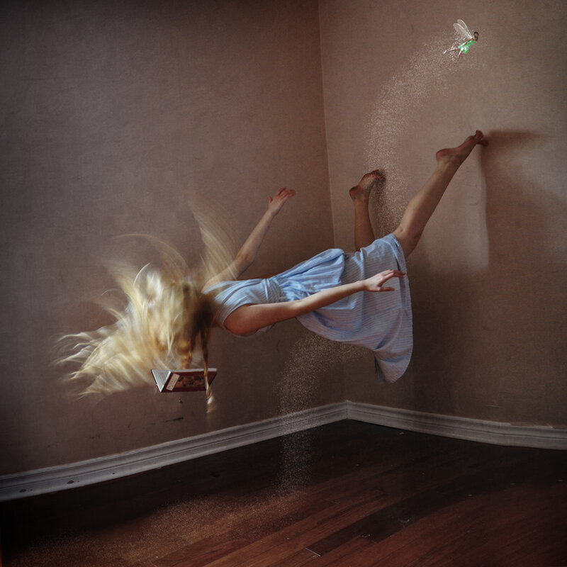 Girl floating in a room