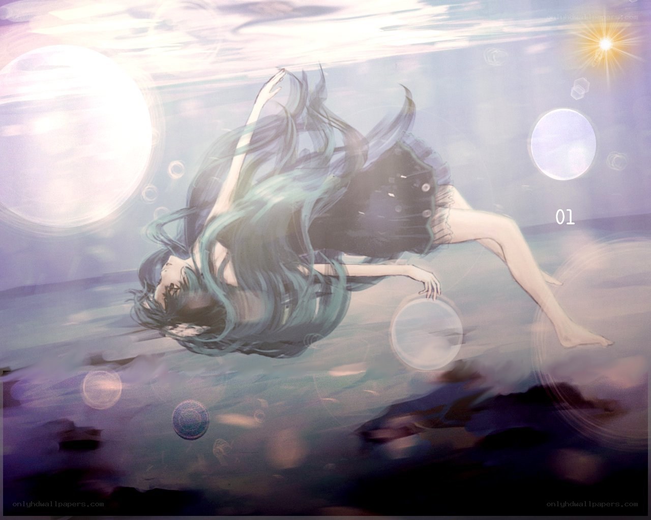 girl floating underwater