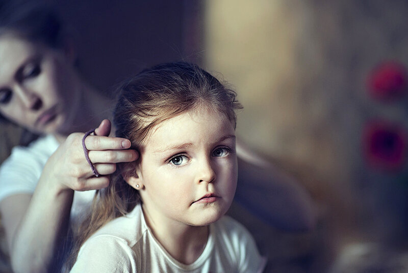 Girl Getting Hair Styled