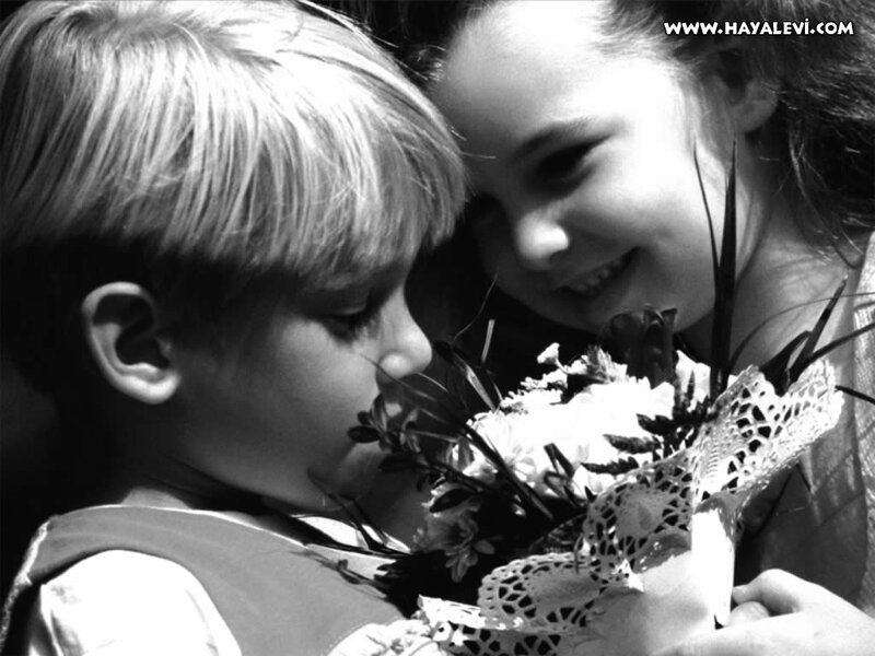 Girl Giving Flowers to Boy