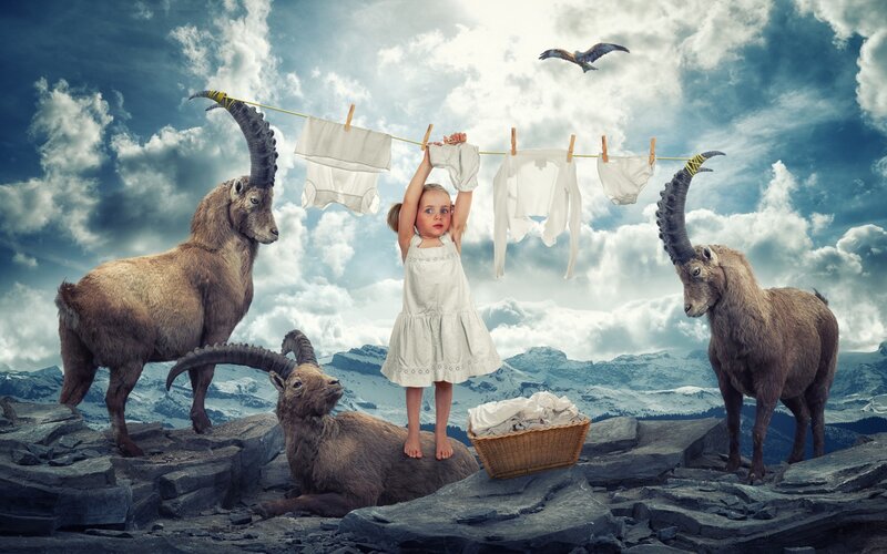 Girl Hanging Laundry — Blue
