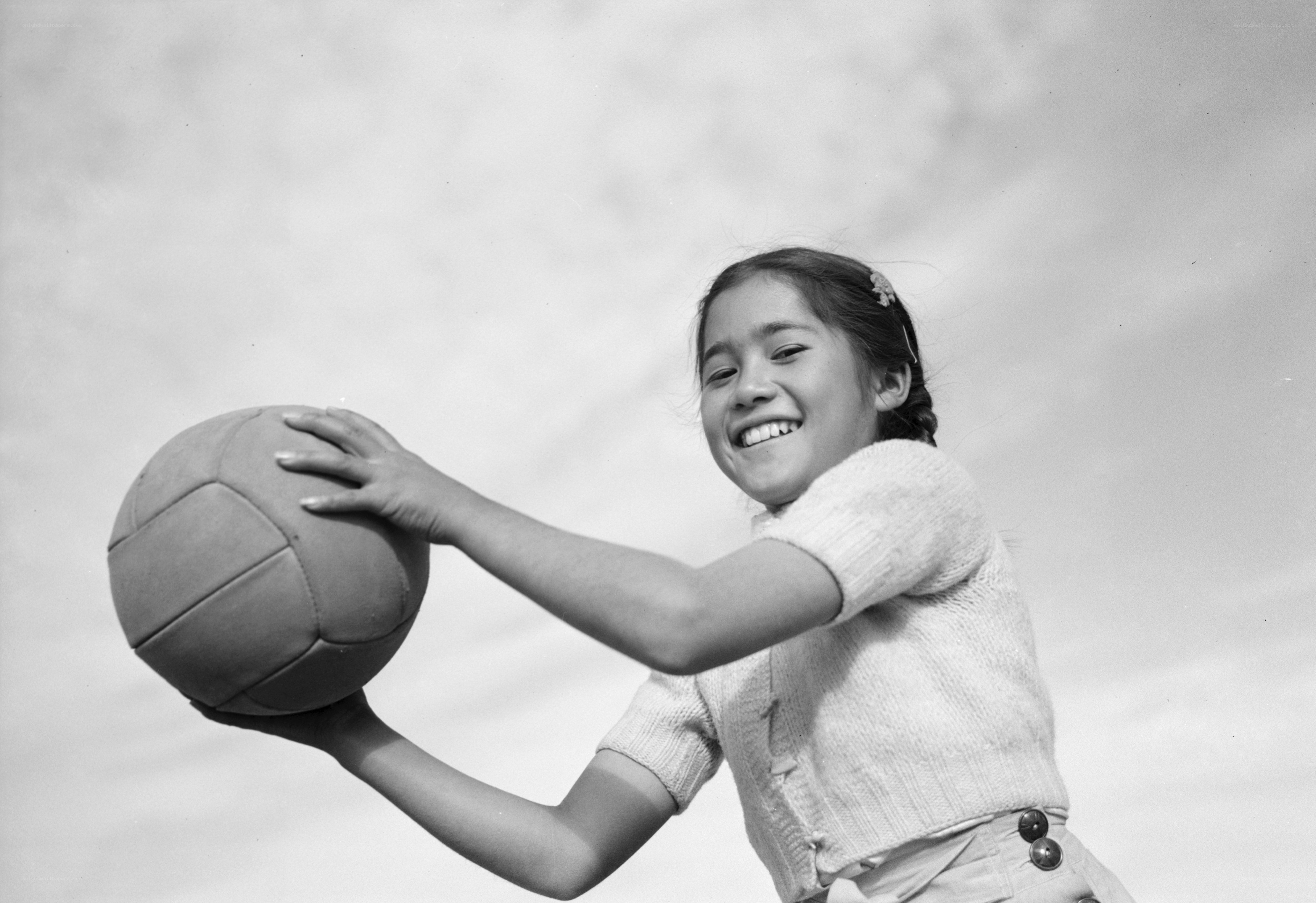 Girl holding a ball