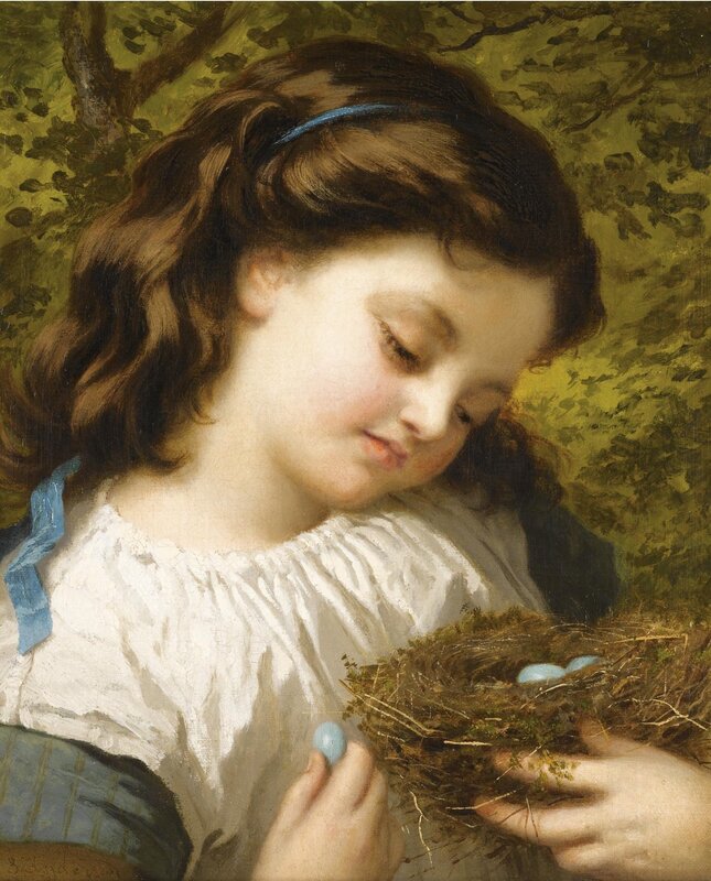 Girl holding a bird's nest