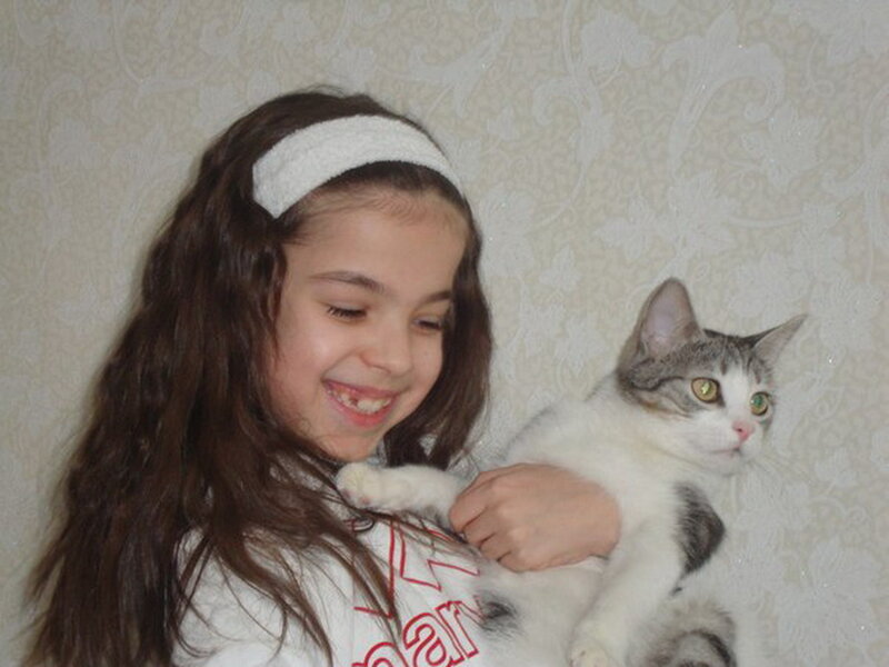 Girl Holding a Cat — White, Calm
