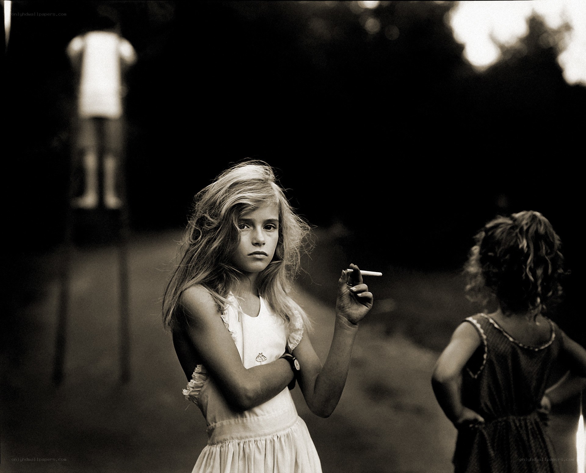 Girl holding a cigarette