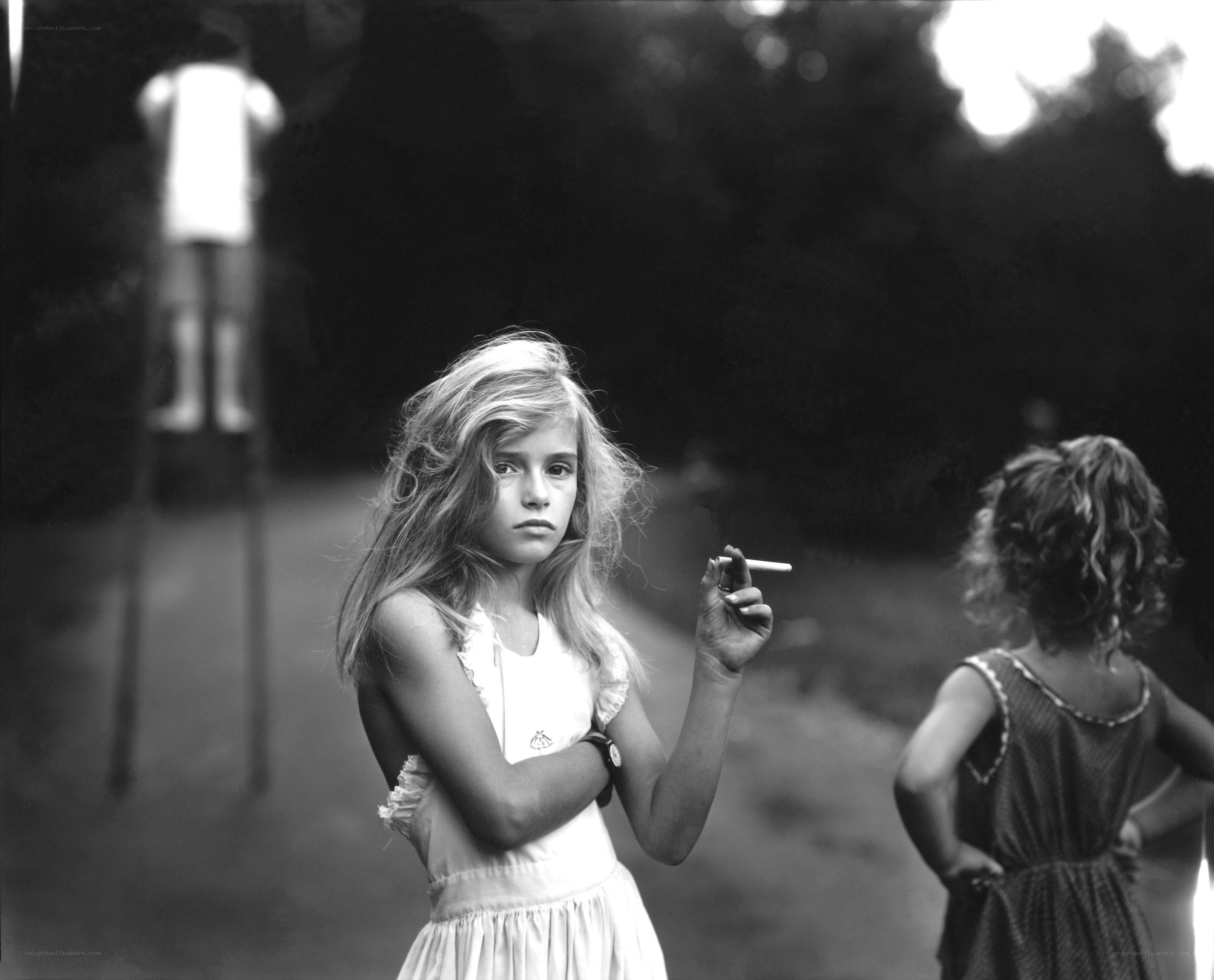 Girl holding a cigarette
