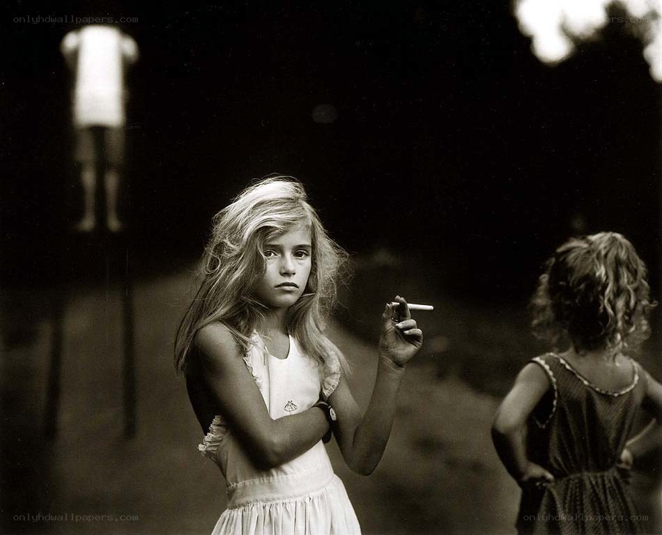 Girl holding a cigarette