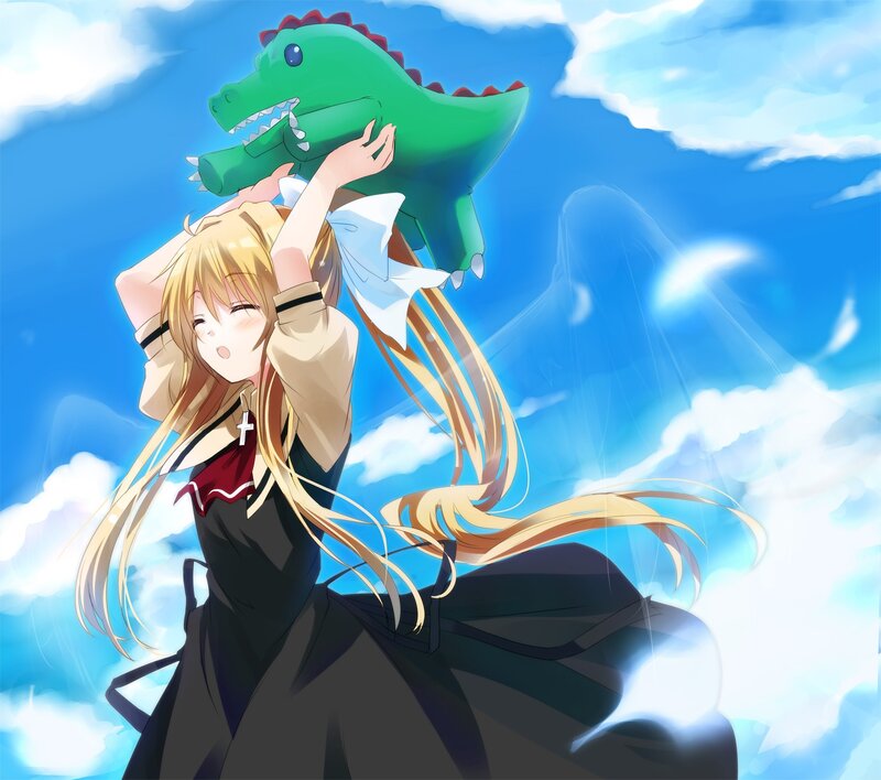 girl holding a dinosaur toy