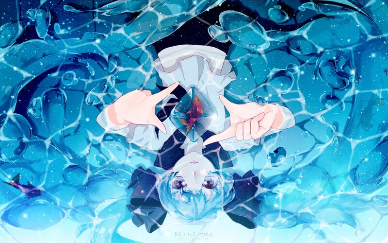 girl holding a fish in a bottle