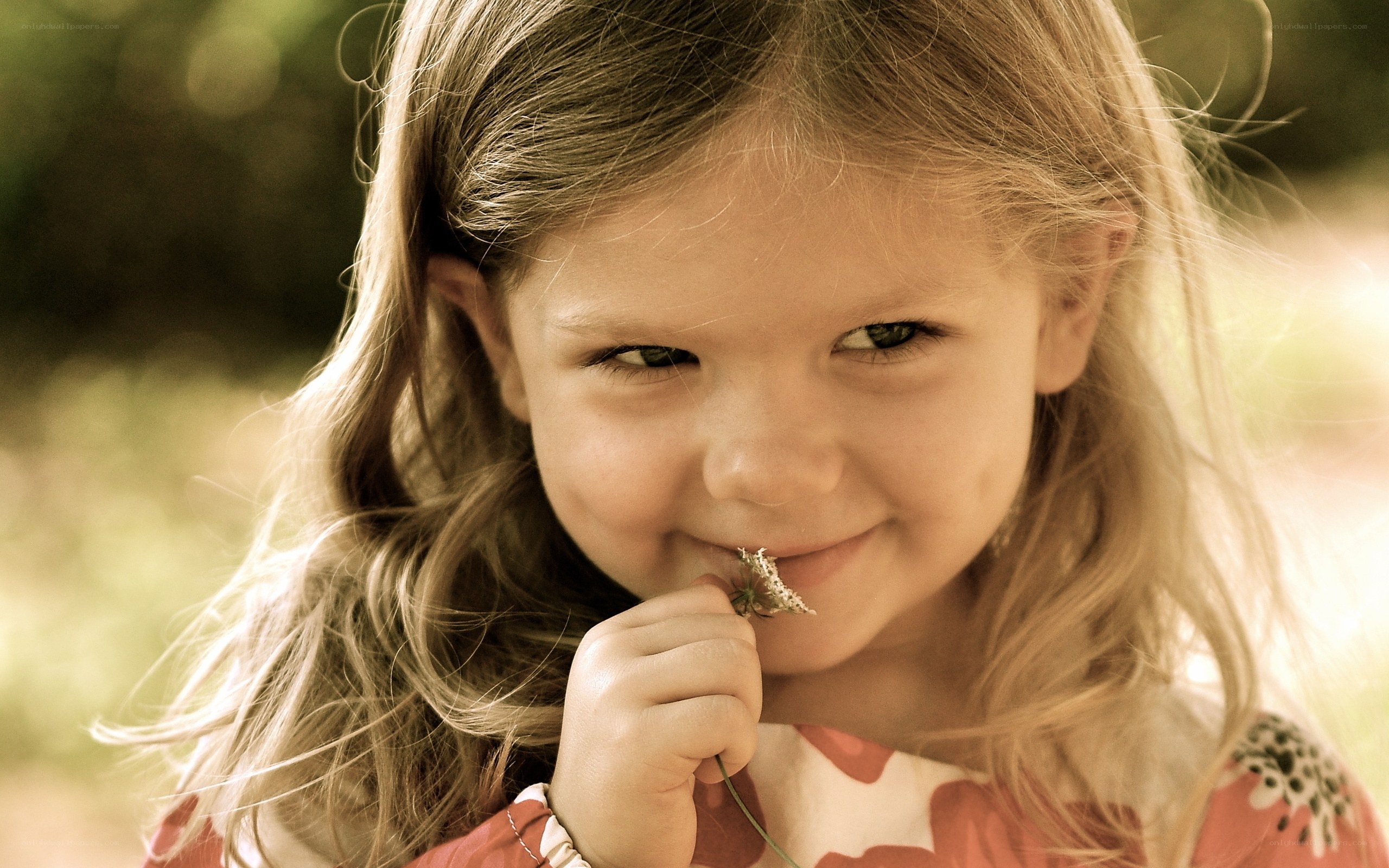 girl holding a flower