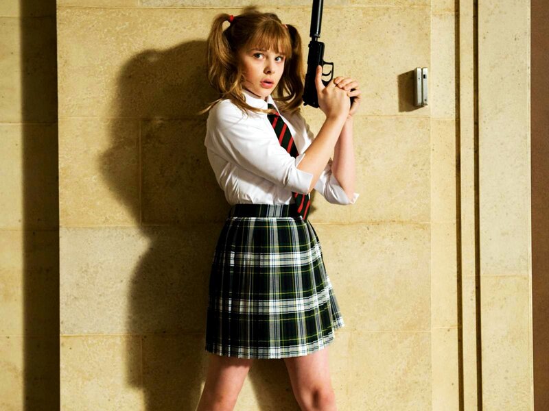 girl holding a gun