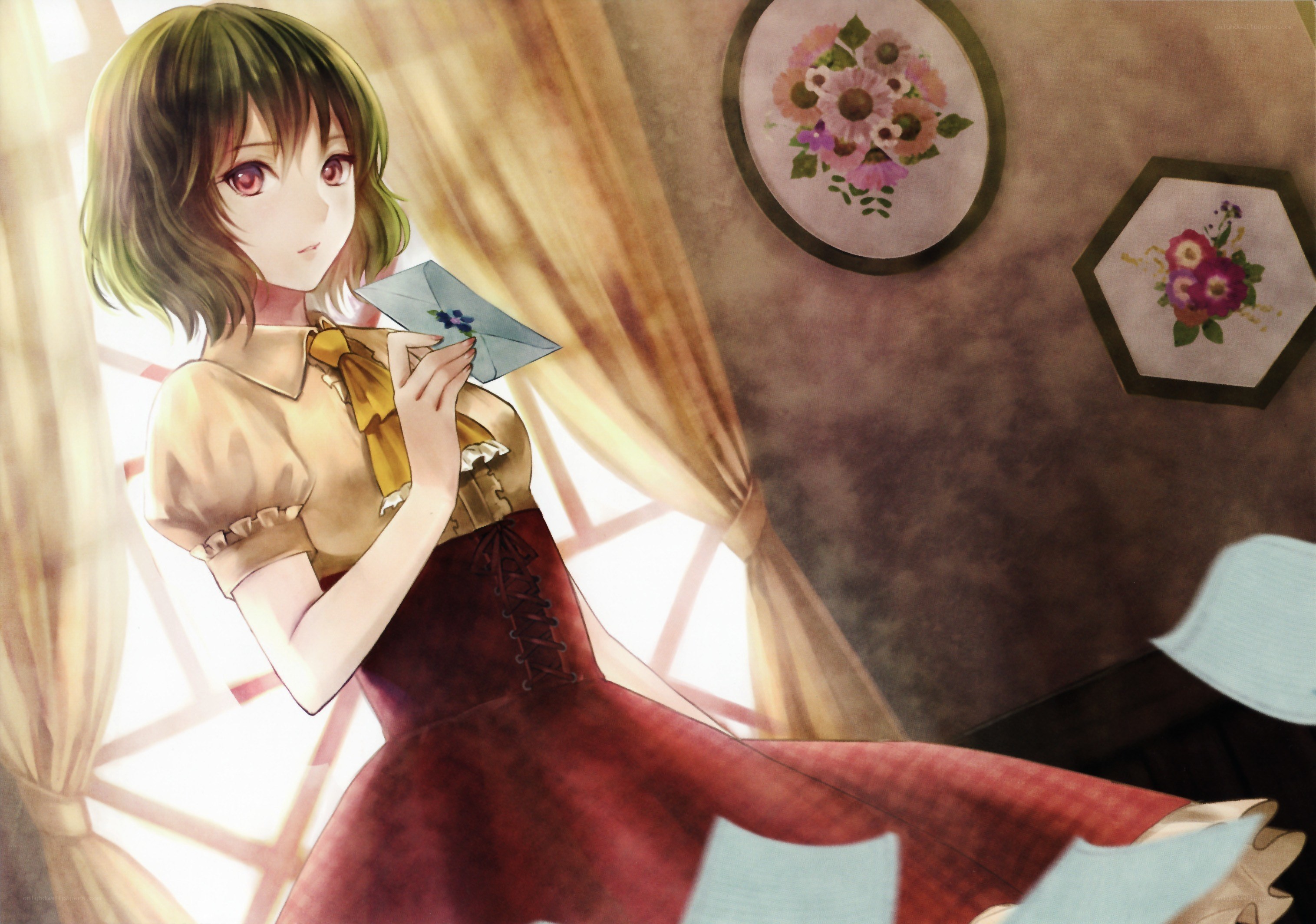 girl holding a letter