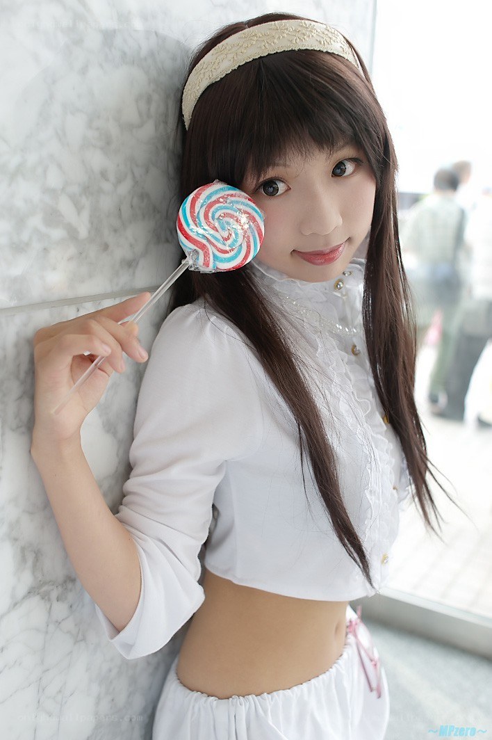 girl holding a lollipop