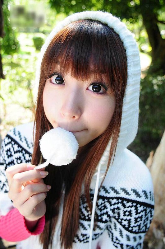 girl holding a pom-pom