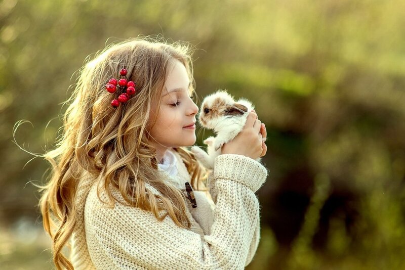 Girl Holding a Rabbit — Beige