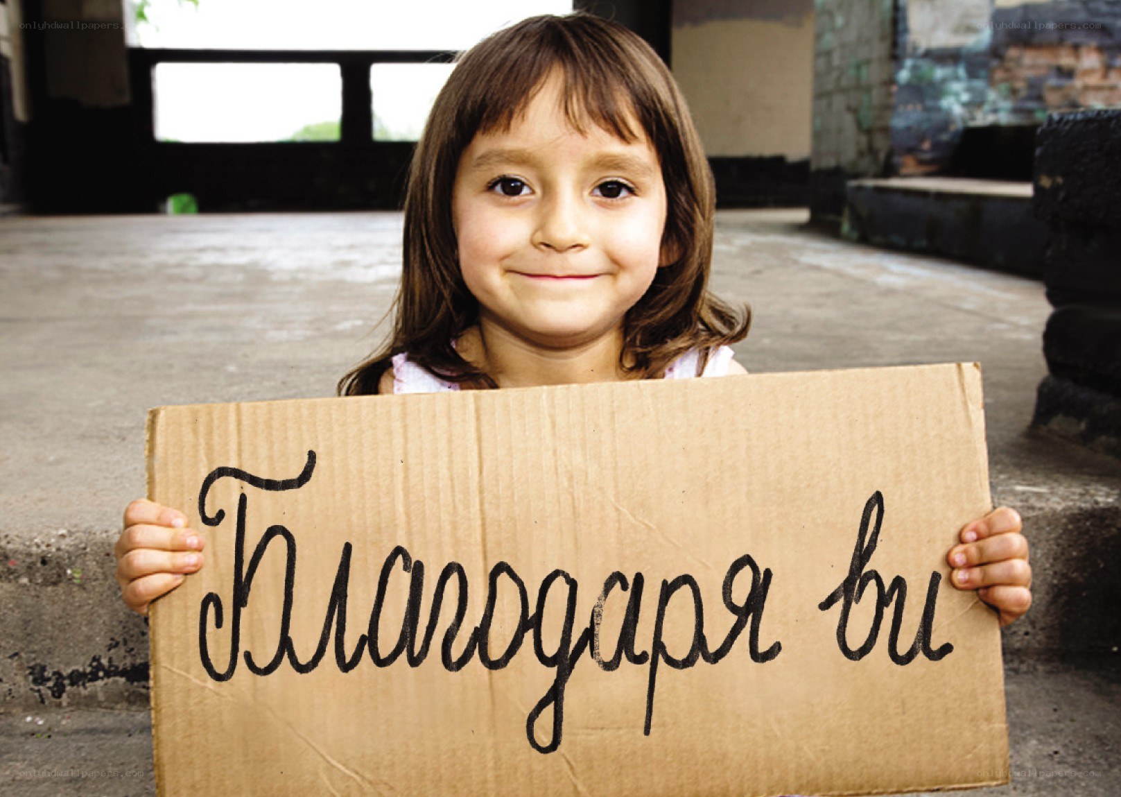Girl holding a sign