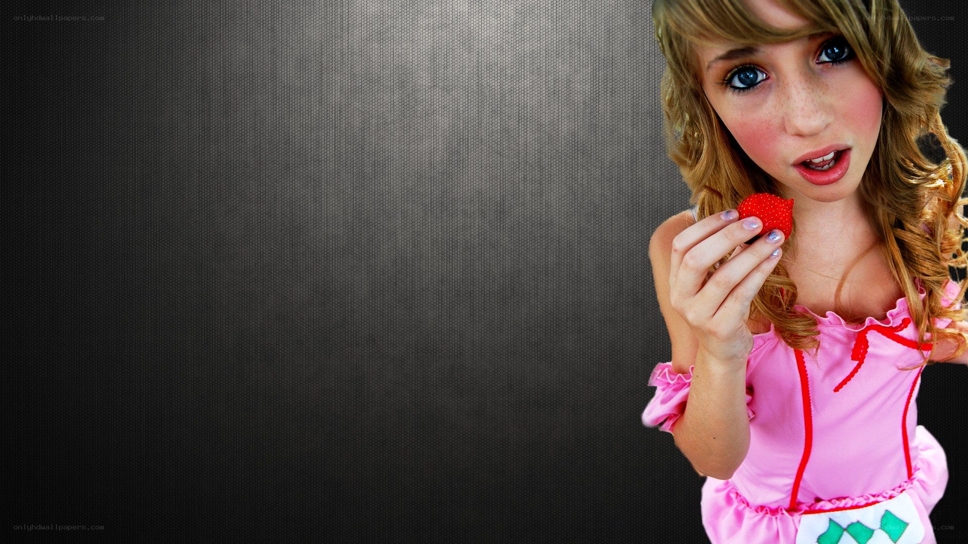 girl holding a strawberry