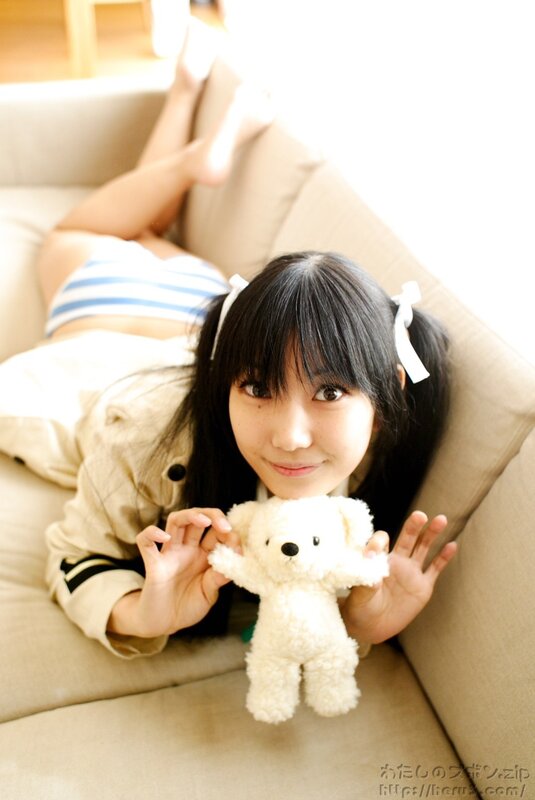 girl holding a teddy bear
