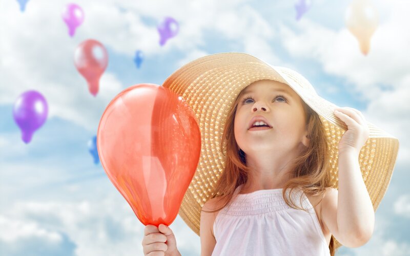Girl Holding Balloon — Blue, Playful