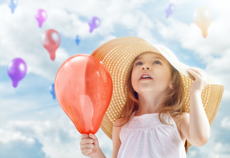 Girl Holding Balloon — Blue