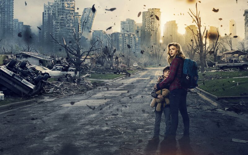 Girl Holding Boy in Ruins